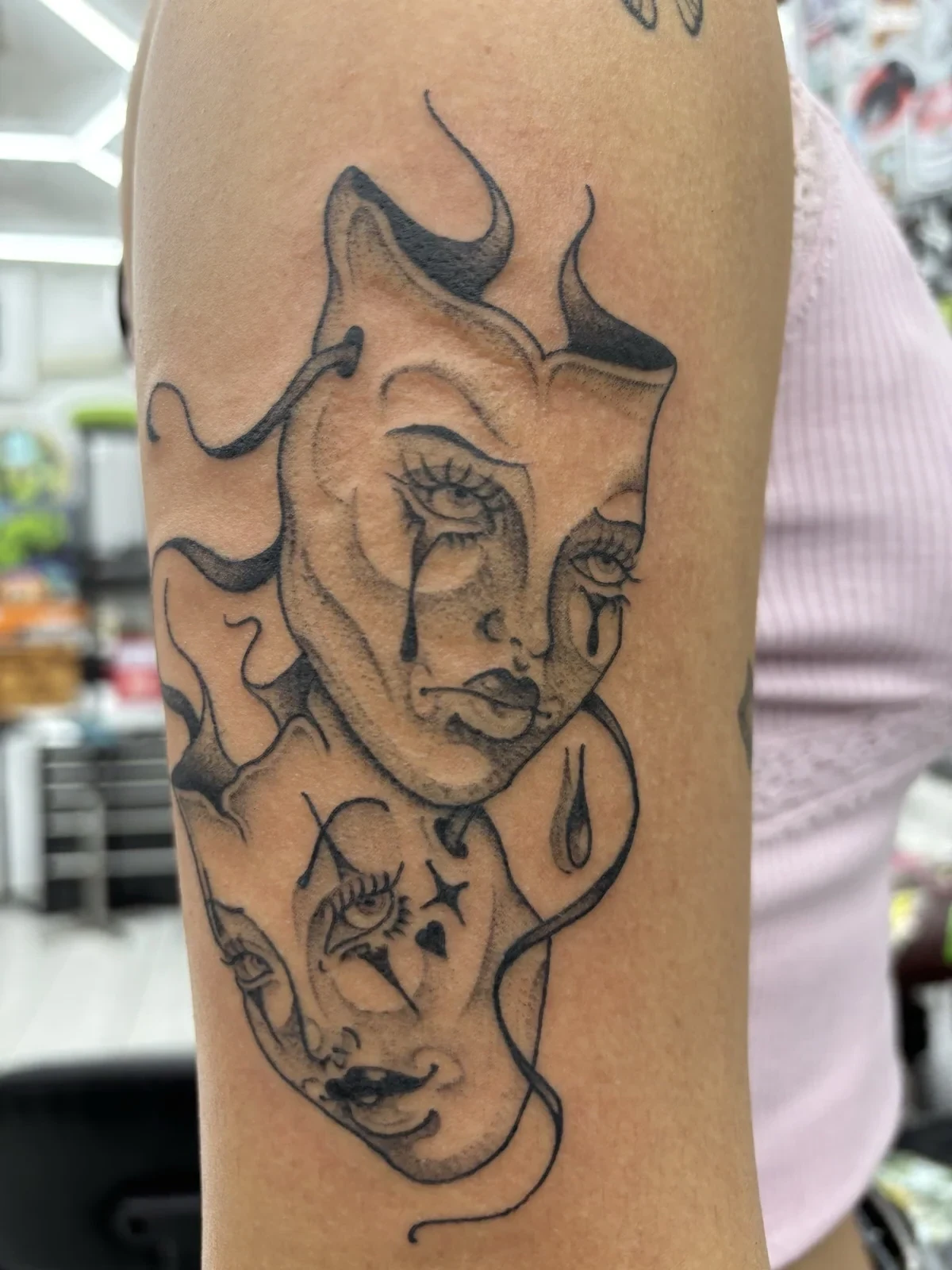 Myles Mokuahi blackwork theatrical masks tattoo Hawaii